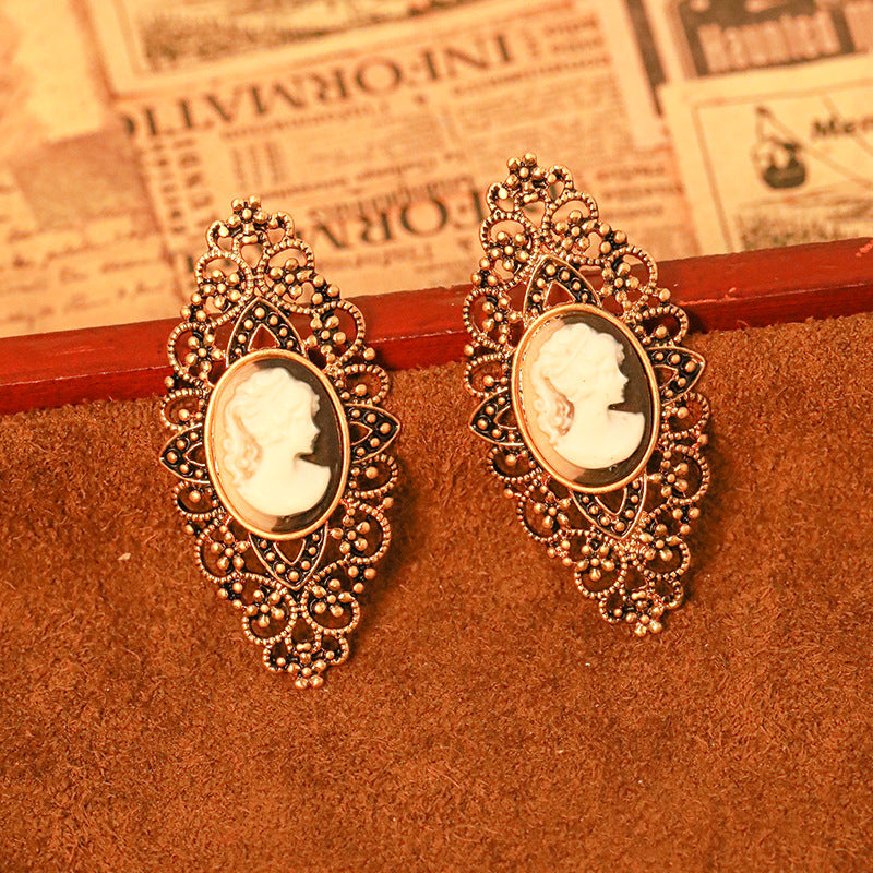 Hollowed-Out Portrait Relief Dangle Earrings